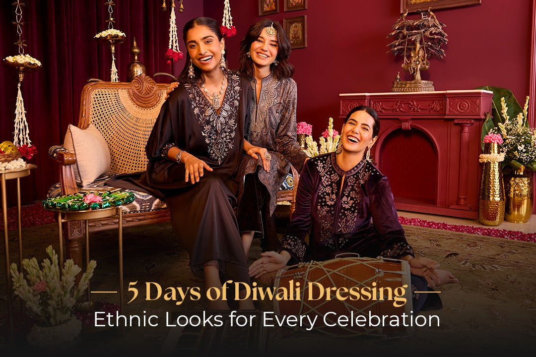 Three women in elegant embroidered ethnic outfits celebrating Diwali in a festive setting — traditional décor, maroon backdrop, and joyful festive vibes. Text overlay: 5 Days of Diwali Dressing – Ethnic Looks for Every Celebration.
