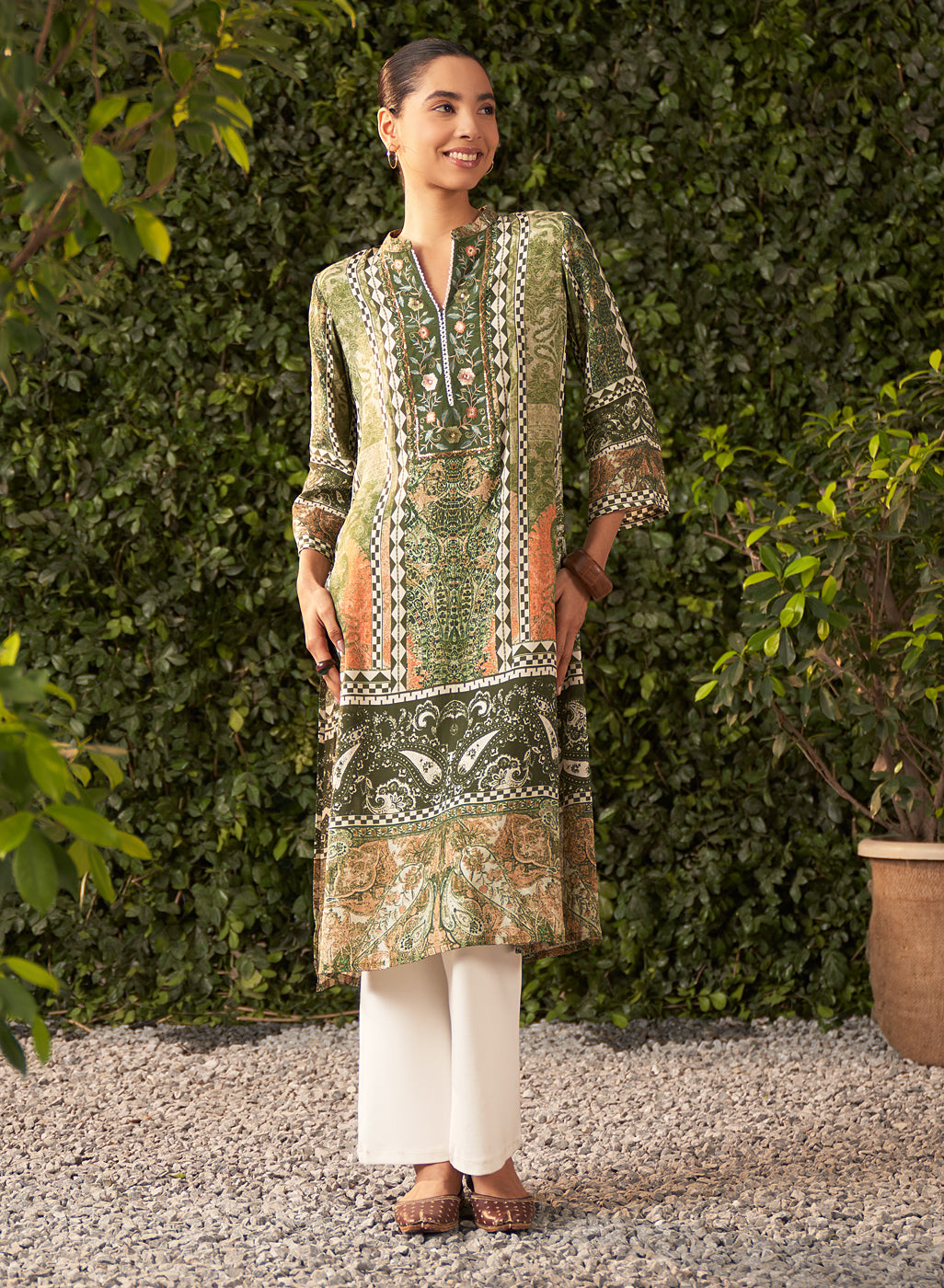 The view of Leaf Green Printed Shantoon Kurta, focusing on resham embroidery with sequin highlights