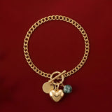 Gold Amara Heart Coin Bracelet