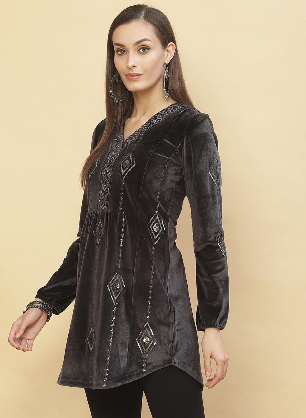 A woman posing in Slate Grey Embroidered Velvet Tunic With Sequins