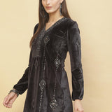 A woman posing in Slate Grey Embroidered Velvet Tunic With Sequins