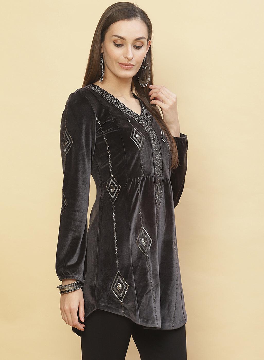 A woman smirking in Slate Grey Embroidered Velvet Tunic With Sequins