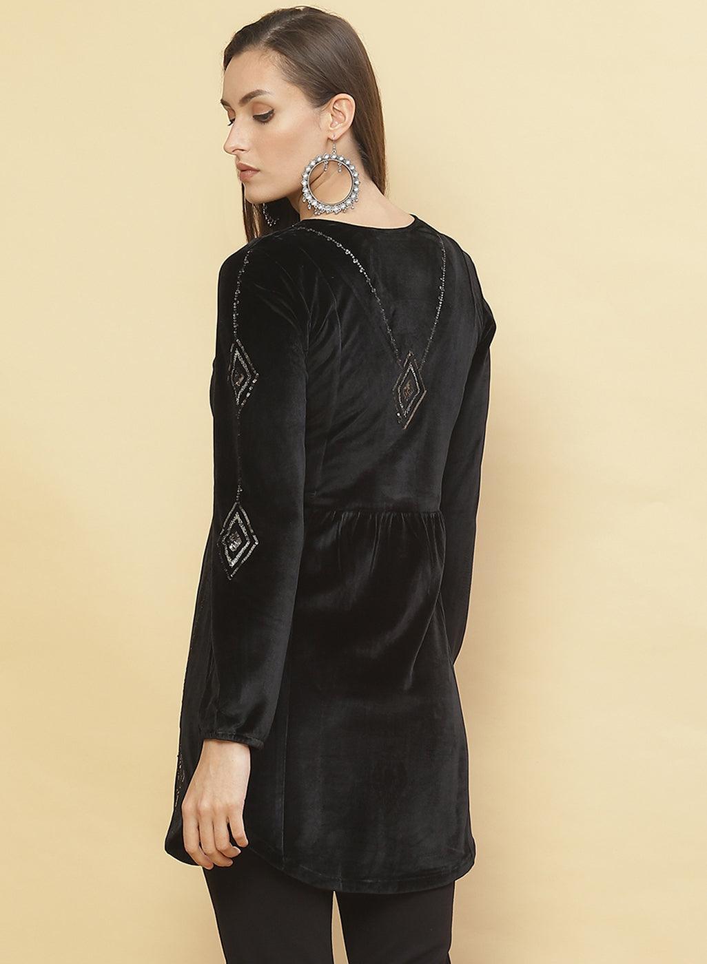 Woman presenting the back of Charcoal Black Embroidered Velvet Tunic With Sequins