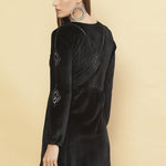 Woman presenting the back of Charcoal Black Embroidered Velvet Tunic With Sequins