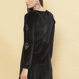 Woman presenting the back of Charcoal Black Embroidered Velvet Tunic With Sequins