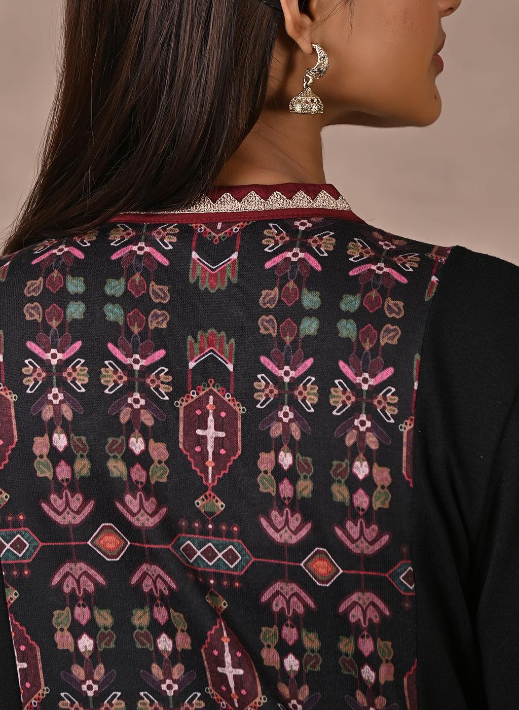 Black Solid Kurta with Tribal Embroidery and Curved Hem - Lakshita