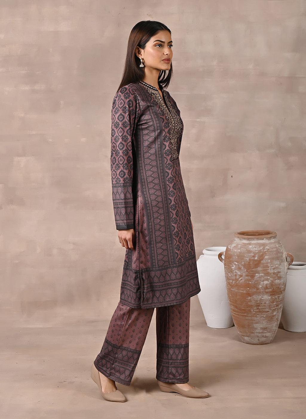 Woman walking sideways in Brown Velvet Kurta Set with Zari & Sequin Work