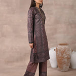Woman walking sideways in Brown Velvet Kurta Set with Zari & Sequin Work