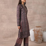 Woman walking sideways in Brown Velvet Kurta Set with Zari & Sequin Work