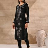 Woman flaunting in Black Velvet Kurta With Fine Mirror Work
