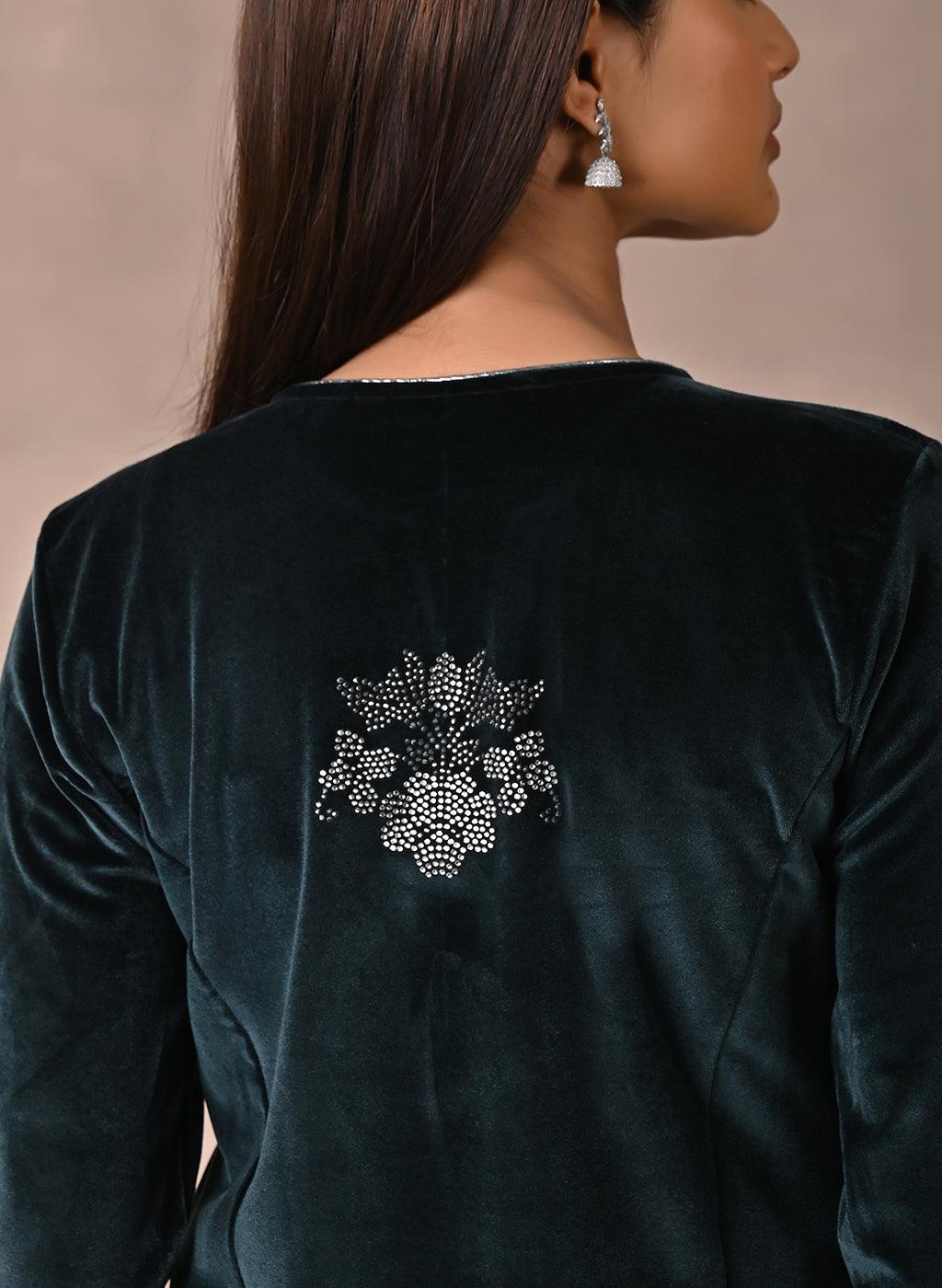 The mirror beads work on the back of Green Velvet Kurta
