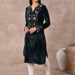 Woman showcasing Green Velvet Kurta with Fine Mirror Beads Work