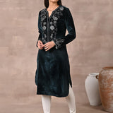 Woman showcasing Green Velvet Kurta with Fine Mirror Beads Work