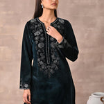 Model flaunting the neckline of the Green Velvet Kurta with Fine Mirror Beads Work
