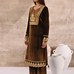 Golden velvet kurta set featuring front embroidery, round collar, and a regular fit calf-length silhouette, paired with matching trousers
