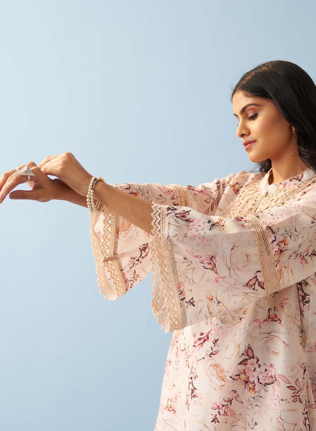 Yellow Floral Printed Loose Fit Kurta with Lace Inserts - Lakshita