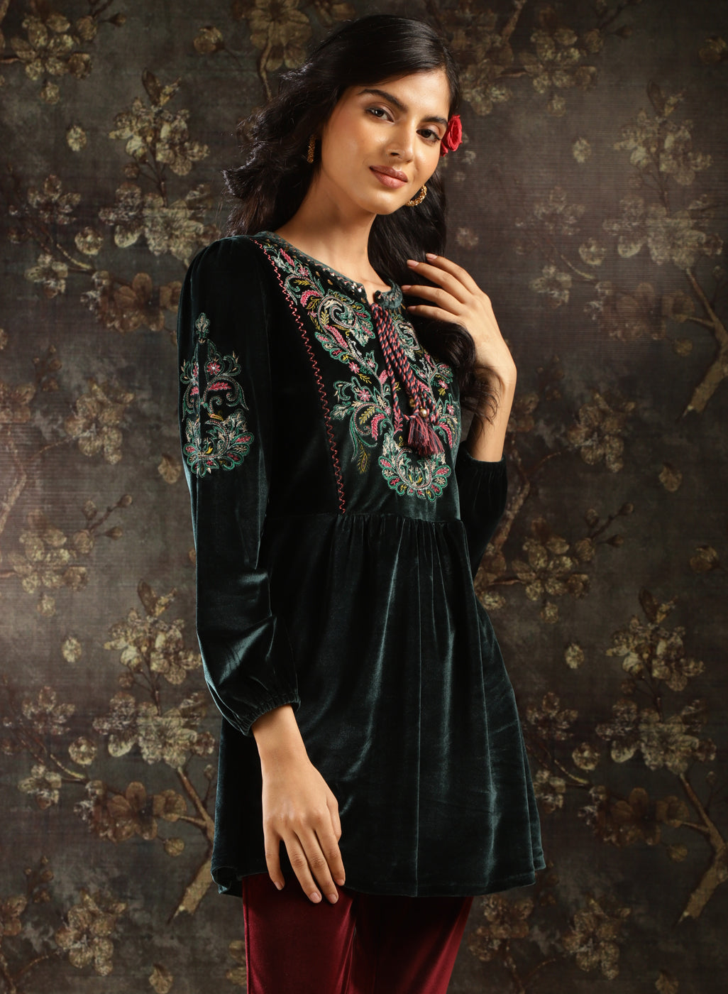 Side view of Green Velvet Tunic with Threadwork on the sleeve