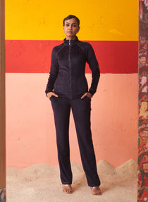 Woman posing in Navy Blue Velvet Track Suit with Stone Work