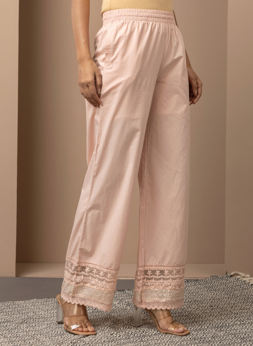 Pink Palazzos With Shimmery Details At The Hems