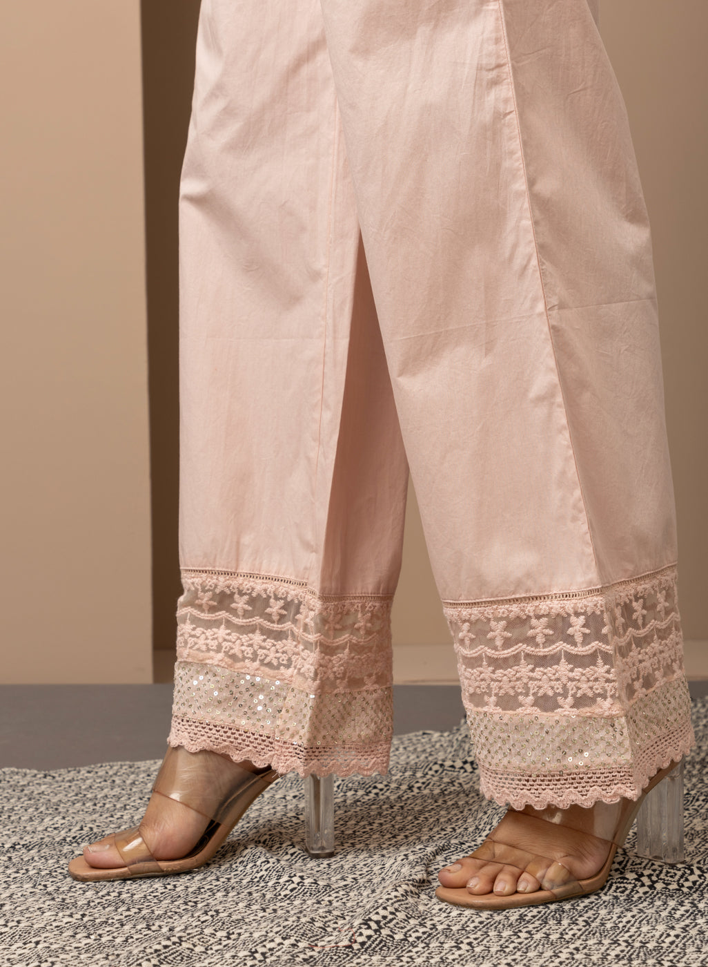 Pink Palazzos With Shimmery Details At The Hems