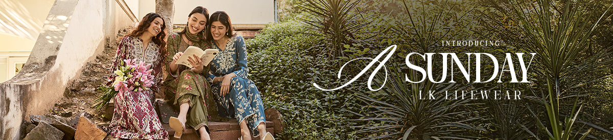 Relaxed Sunday moods with three friends in Lakshita's vibrant printed outfits, enjoying a book amid lush greenery