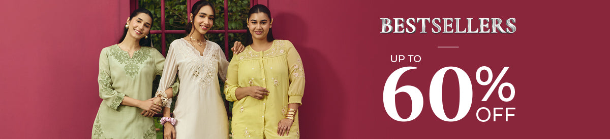Women in elegant printed co-ords enjoying a relaxed garden picnic – a showcase of this season’s most loved silhouettes