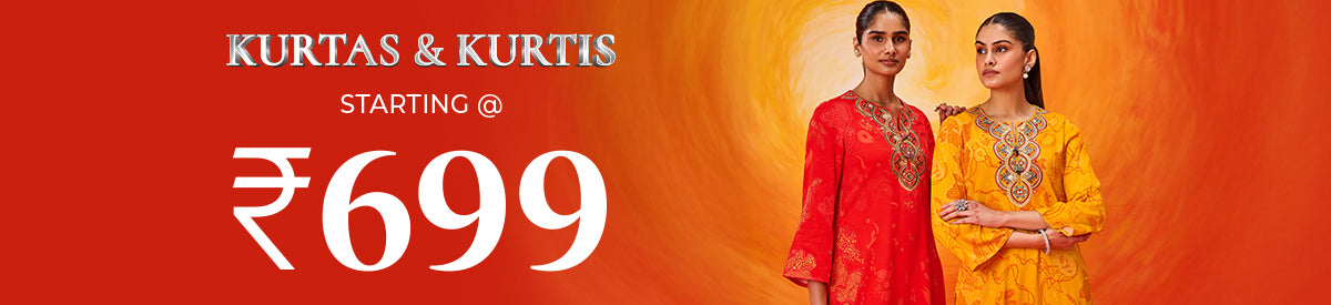 Woman in floral pink kurta sipping a drink beside a bicycle filled with flowers — spotlighting Kurtas & Kurtis collection