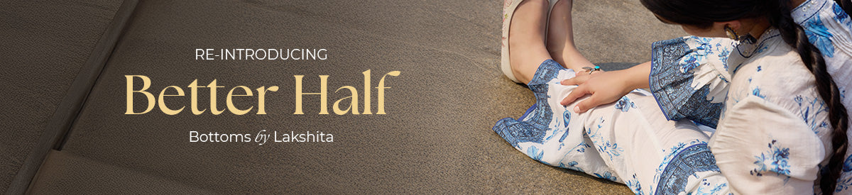 Three women lounging in stylish ethnic bottoms on a vintage cream couch showcasing the Lakshita Bottoms Collection