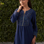 Close-up of embroidery on navy blue cotton gauze kurta for women