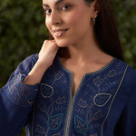 The detailed floral motifs in Lakshita’s Navy Blue Embroidered Cotton Gauze Kurta is highlited