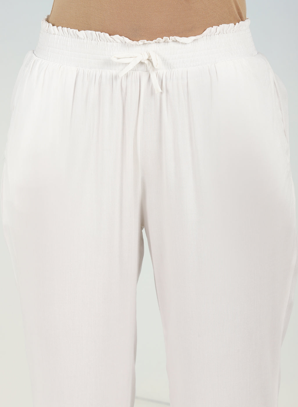 Ivory Ankle-length Pants for Women with drawstring Waist and Lace Work on the Hem
