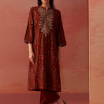 The model is seen donning the Nyla Maroon Printed Viscose Co-ord Set from Lakshita