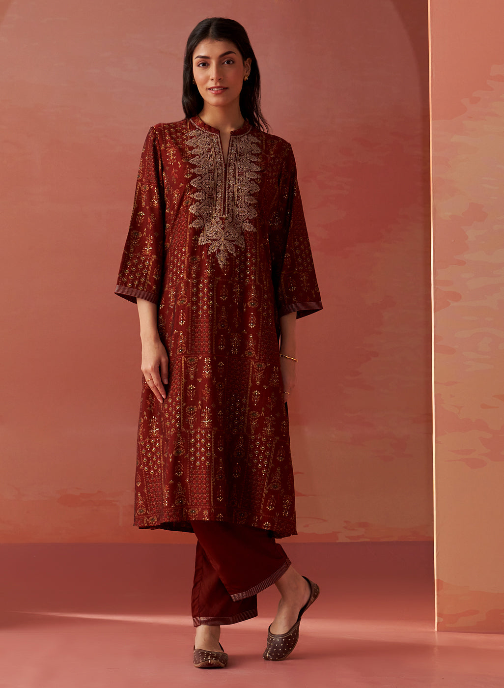 The model is seen donning the Nyla Maroon Printed Viscose Co-ord Set from Lakshita