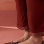 The model with the bottomwear and traditional juttis has been focused 