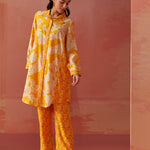 Back view of Seher bright yellow printed Chanderi co-ord set featuring floral patterns on long kurta and matching pants.