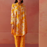 Front view of bright yellow printed Chanderi co-ord set for women featuring floral motifs and a relaxed collared kurta.