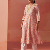 The model adds flair to Lakshita’s Rumaisa Chanderi Jacquard Co-ord Set in vibrant orange print