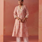 The model is styled in Lakshita's vibrant Rumaisa Orange Printed Chanderi Jacquard Co-ord Set