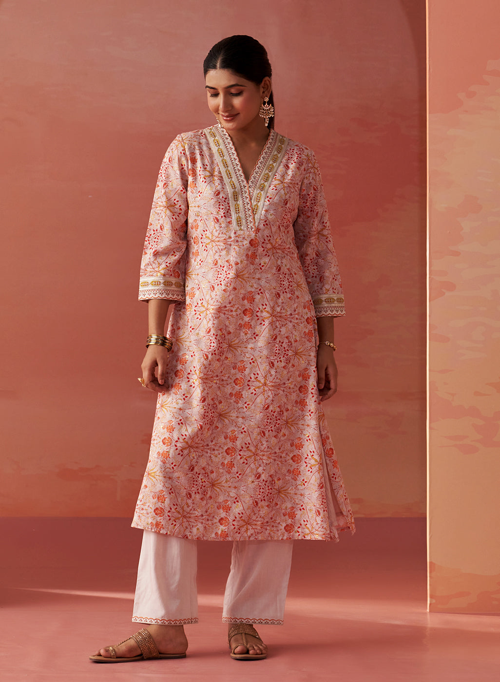 Making a statement, the model wears Lakshita’s Rumaisa Orange Chanderi Jacquard Co-ord Set