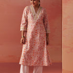 Making a statement, the model wears Lakshita’s Rumaisa Orange Chanderi Jacquard Co-ord Set