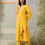 Sunflower Yellow embroidered kurta set by Lakshita shown in full front view with straight silhouette and solid pants.