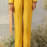 Front view of Lakshita Ulfat Sunflower Set solid straight pants with mid-rise fit, side slit pockets, and clean hemline.