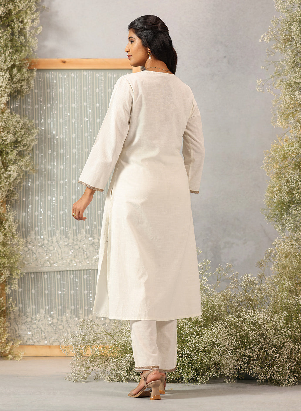 Back view of Ulfat Pearl Ivory Kurta Set showcasing clean, solid cotton linen fabric with no embroidery for a minimal look.