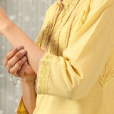Solid Yellow Textured Kurta Set with Schiffli & Lace Work