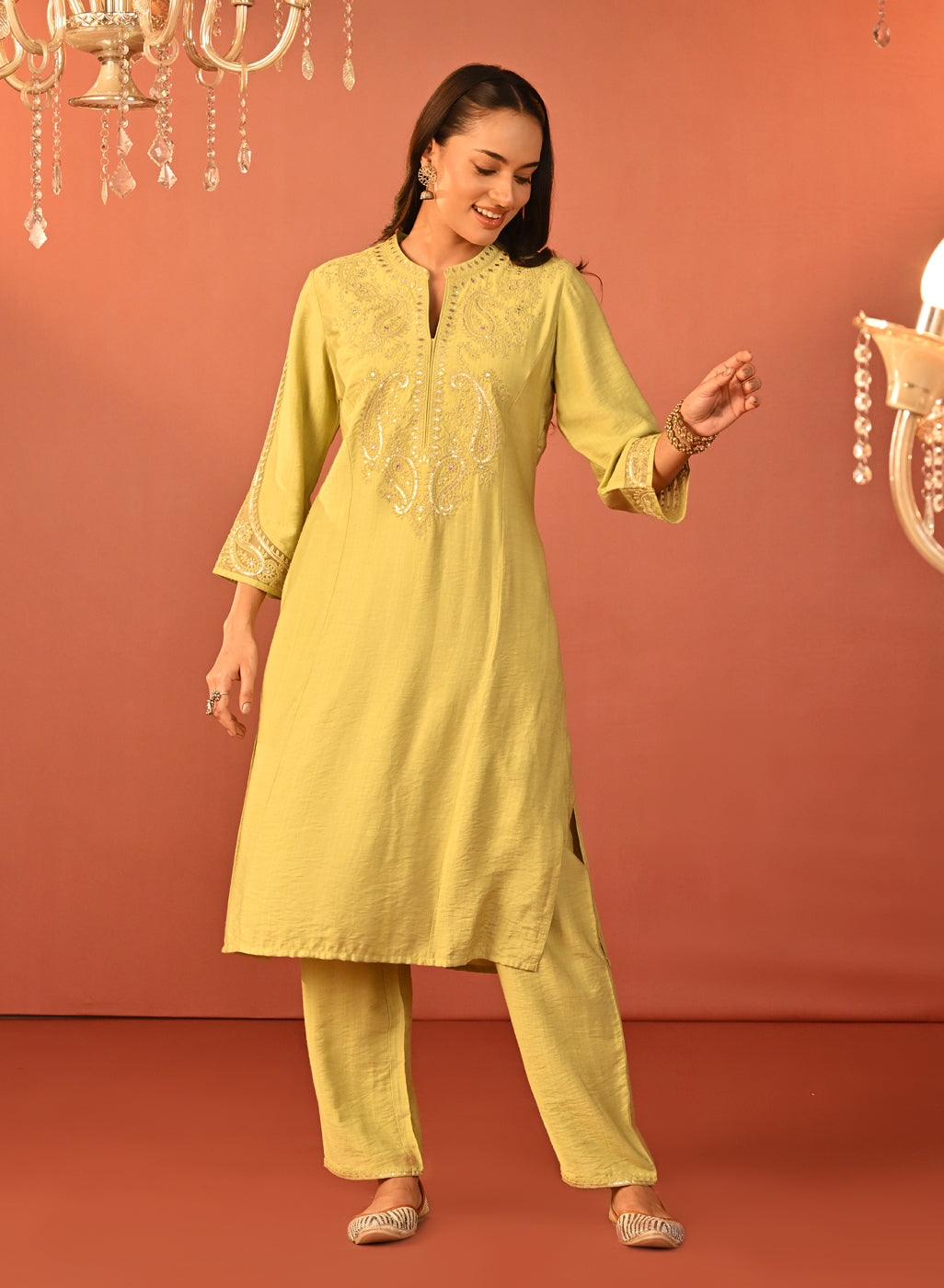 Green embroidered rayon kurta set with intricate designs, showcasing an elegant and flattering fit and delicate detailing