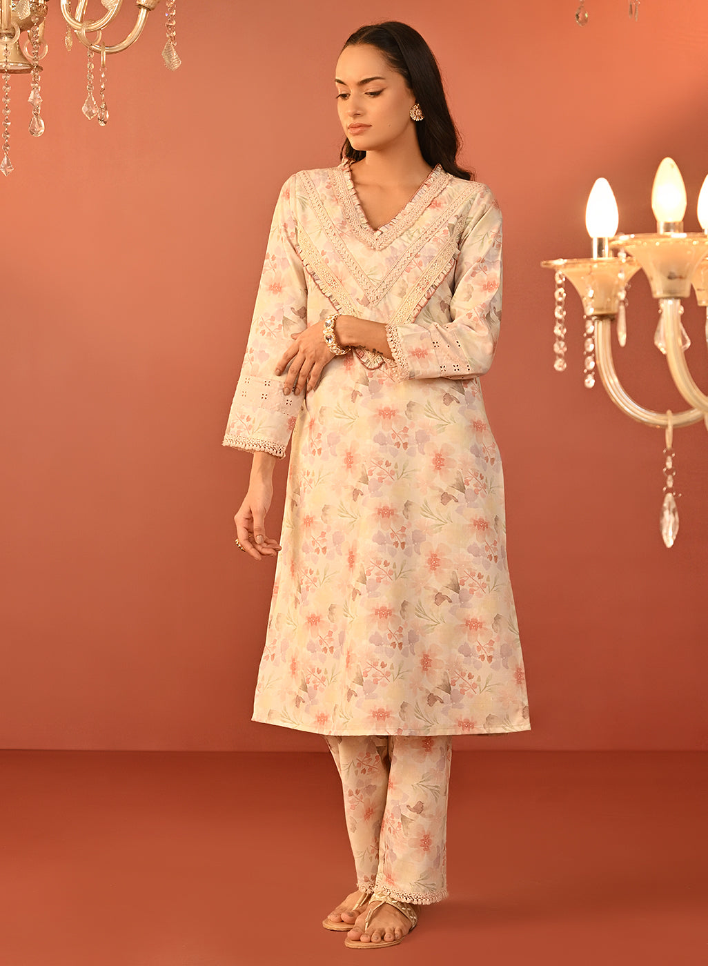 Back view of lavender floral printed co-ord set featuring embroidered detailing on yoke and lace-trimmed sleeves and hem.