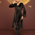 Woman making a dance move in Sadia Brown Embroidered Velvet Co-ord Set