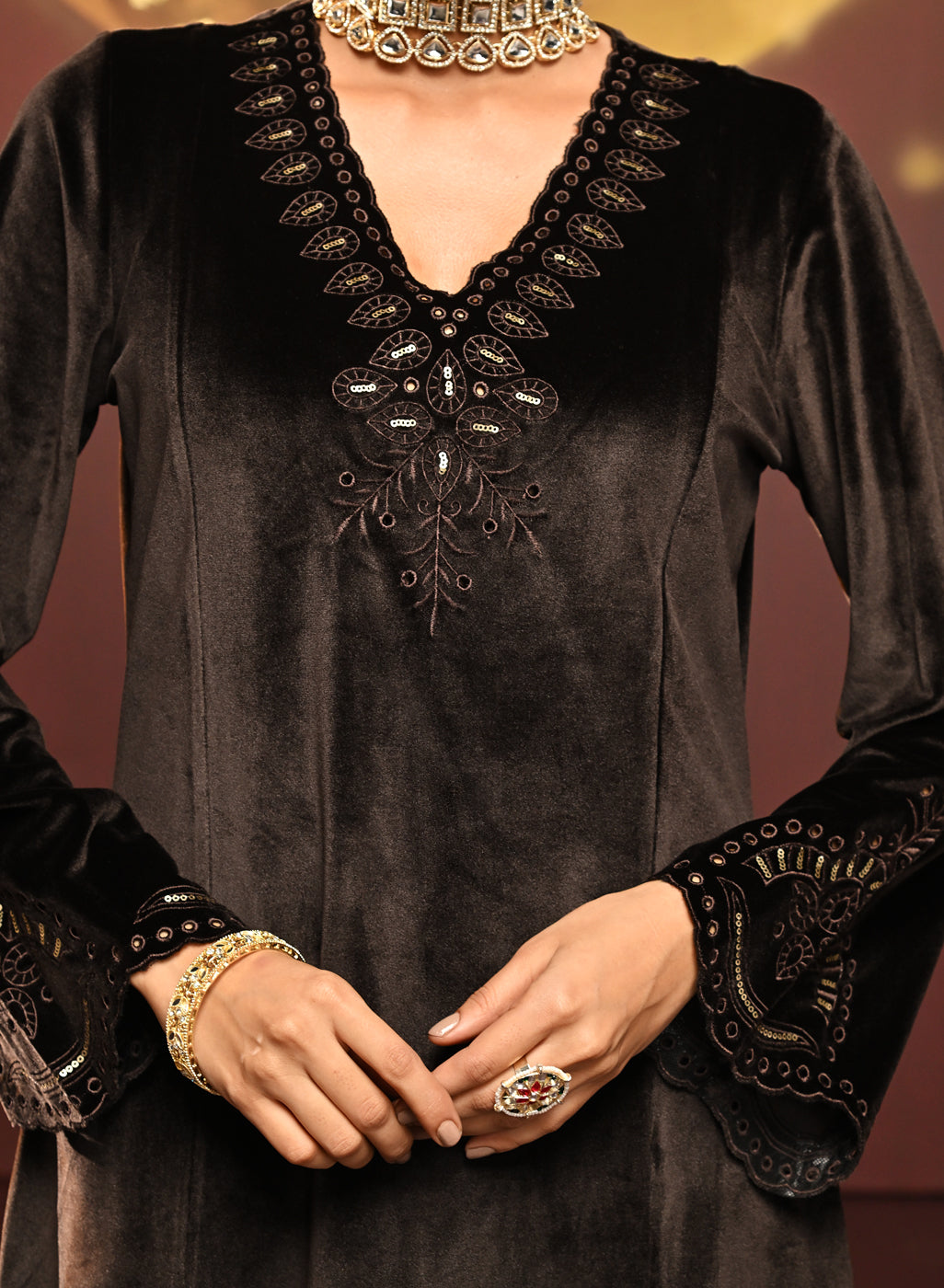 The detail work on neckline and sleeves of Sadia Brown Embroidered Velvet Co-ord Set