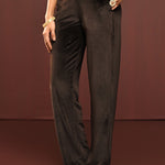 Woman showcasing the bottomwear of Sadia Brown Embroidered Velvet Co-ord Set