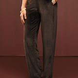 Woman showcasing the bottomwear of Sadia Brown Embroidered Velvet Co-ord Set